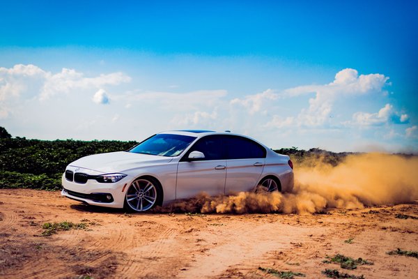 White Bmw On Dusty Road — cars wallpaper, 4K